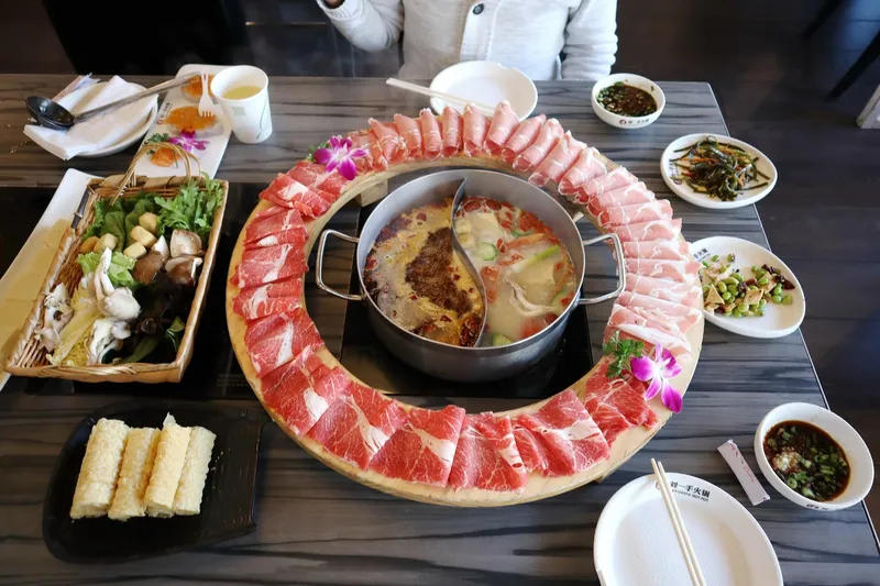 Hot pot with sliced meat platter at Liuyishou Hotpot