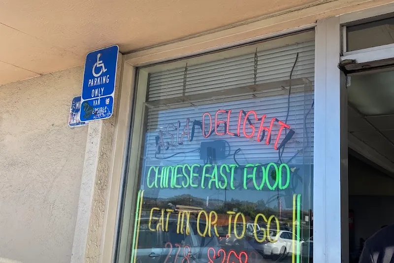 Asia Delight neon window sign in San Leandro